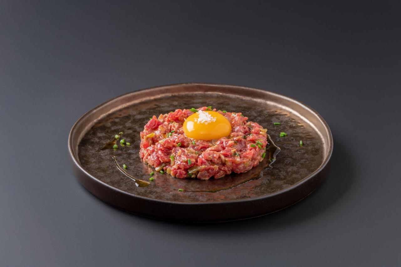 Eurostars Portico Alicante Exterior photo A plate of tartar